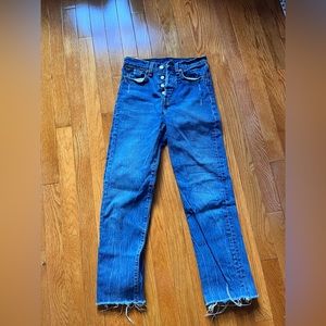 Levis straight jeans. Button fly, frayed hem. In great shape